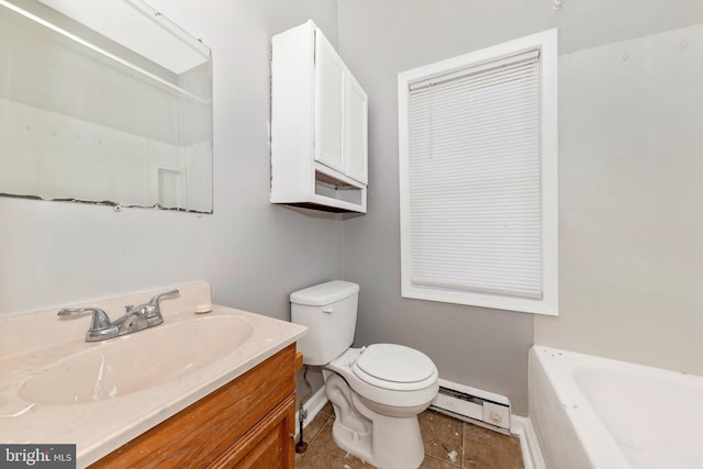 bathroom with a tub to relax in, baseboards, toilet, baseboard heating, and vanity