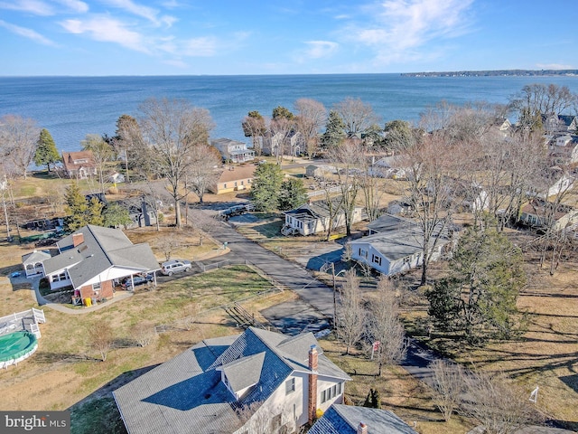 aerial view featuring a water view and a residential view