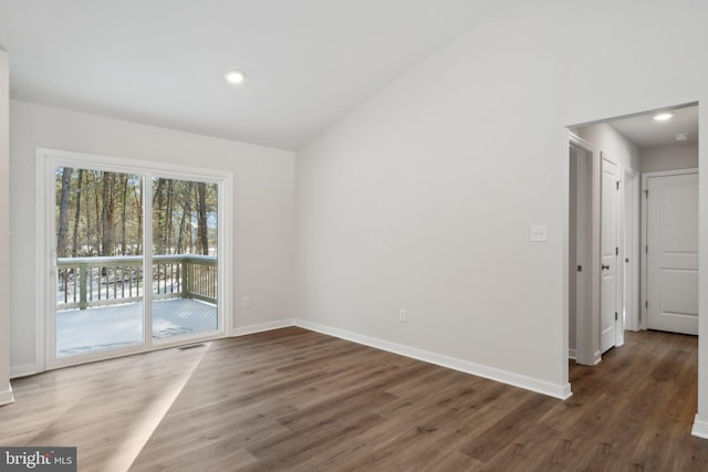 spare room with dark wood-type flooring, recessed lighting, visible vents, and baseboards