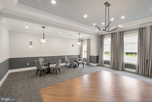 dining room featuring light carpet, baseboards, crown molding, and recessed lighting