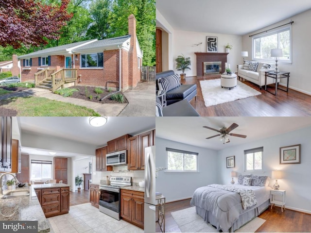 7424 Nancemond St, Springfield, VA 22150 - bedroom featuring a brick fireplace, a sink, baseboards, freestanding refrigerator, and light wood-style flooring
