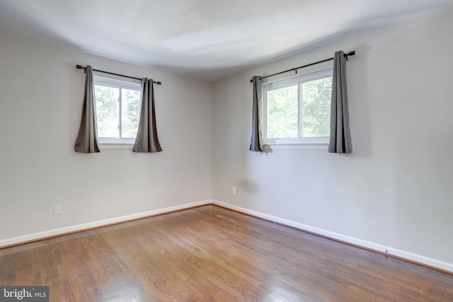 7424 Nancemond St, Springfield, VA 22150 - empty room with baseboards and wood finished floors