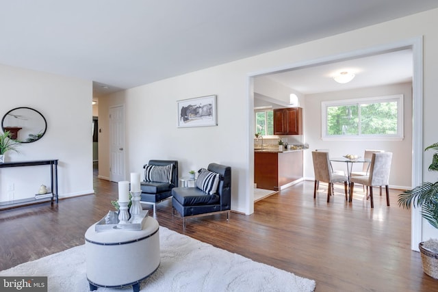 7424 Nancemond St, Springfield, VA 22150 - living room with baseboards and dark wood finished floors