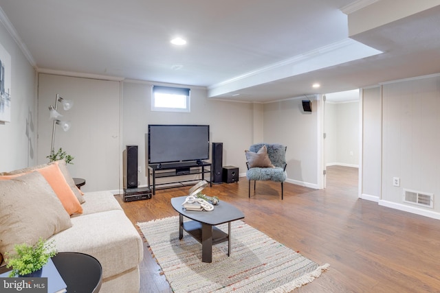 7424 Nancemond St, Springfield, VA 22150 - living room with baseboards, visible vents, ornamental molding, and wood finished floors