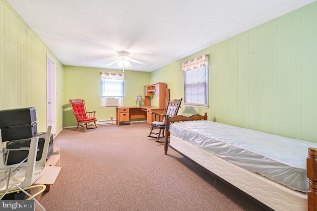 bedroom with carpet floors, baseboards, a ceiling fan, and cooling unit