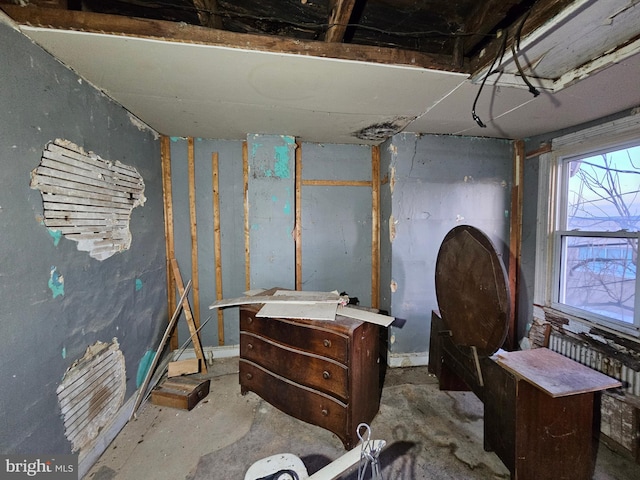 miscellaneous room featuring unfinished concrete floors