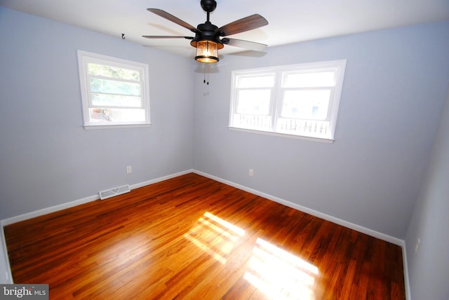 307 Broad St, Hainesport, NJ 08036 - spare room featuring baseboards, visible vents, wood finished floors, and a ceiling fan