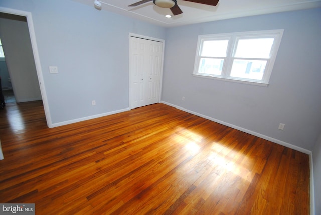 307 Broad St, Hainesport, NJ 08036 - unfurnished bedroom with a ceiling fan, baseboards, a closet, and wood finished floors