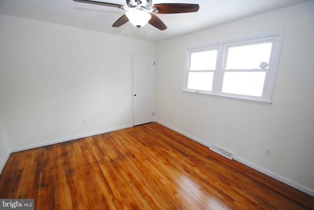 307 Broad St, Hainesport, NJ 08036 - empty room featuring baseboards, visible vents, wood finished floors, and a ceiling fan