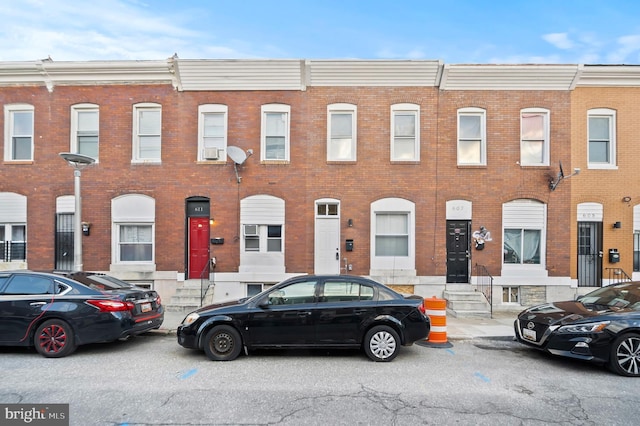 multi unit property featuring brick siding