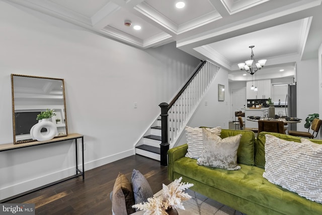 living area with a chandelier, coffered ceiling, baseboards, stairs, and dark wood-style floors