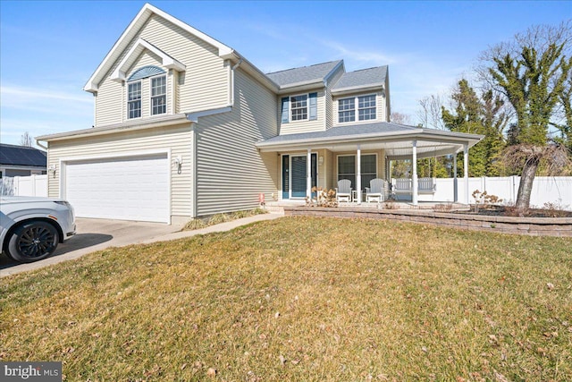 traditional-style house featuring a garage, driveway, covered porch, fence, and a front yard