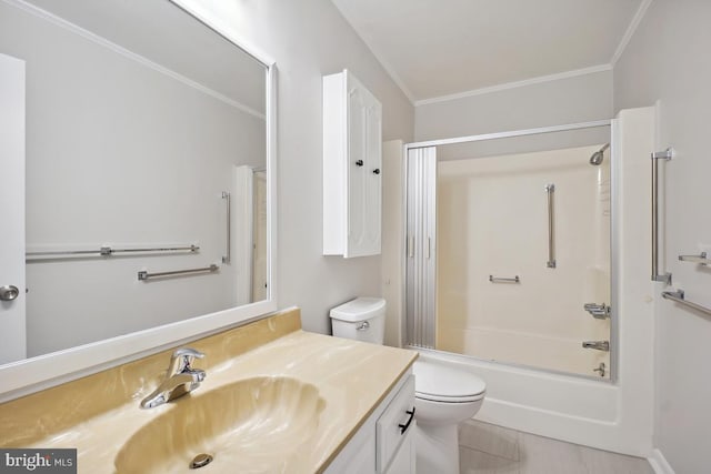 full bath featuring bathing tub / shower combination, toilet, ornamental molding, and vanity