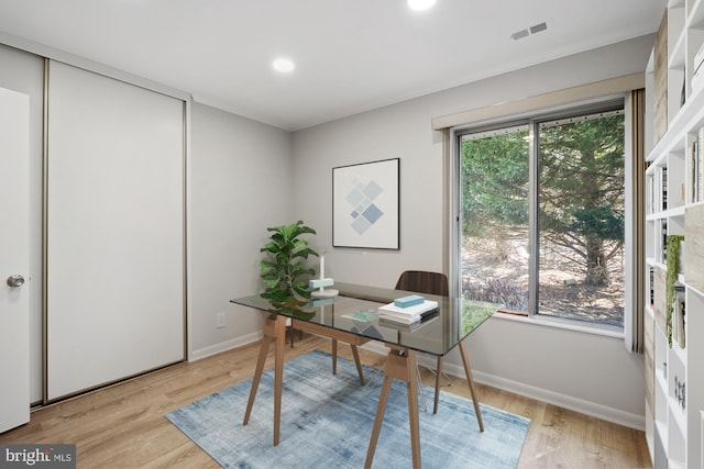 office area featuring recessed lighting, visible vents, baseboards, and light wood finished floors