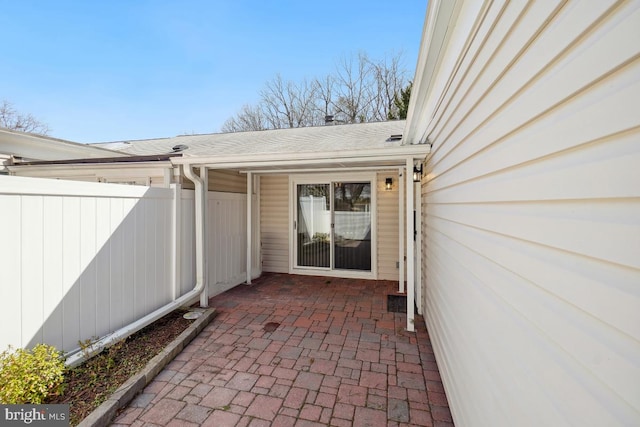 view of patio featuring fence