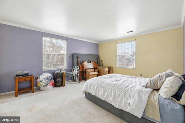 bedroom featuring carpet floors, visible vents, and crown molding