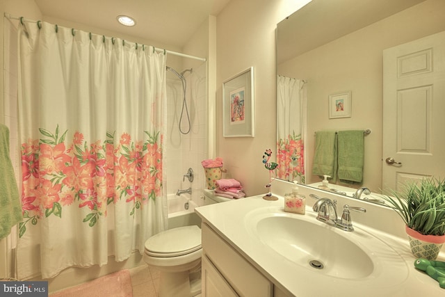 bathroom featuring toilet, vanity, shower / bath combination with curtain, and tile patterned floors