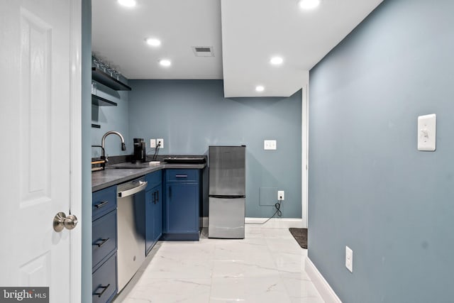 kitchen featuring a sink, marble finish floor, appliances with stainless steel finishes, open shelves, and dark countertops