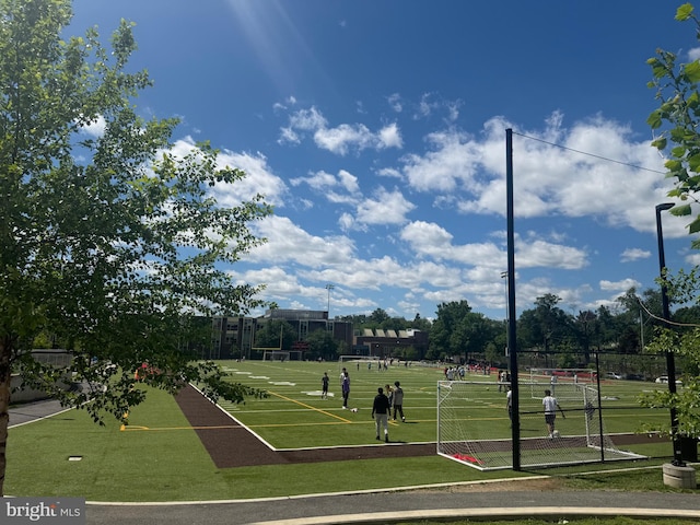 641 Franklin St NE, Washington, DC 20017 - view of home's community with an area for sports and fence