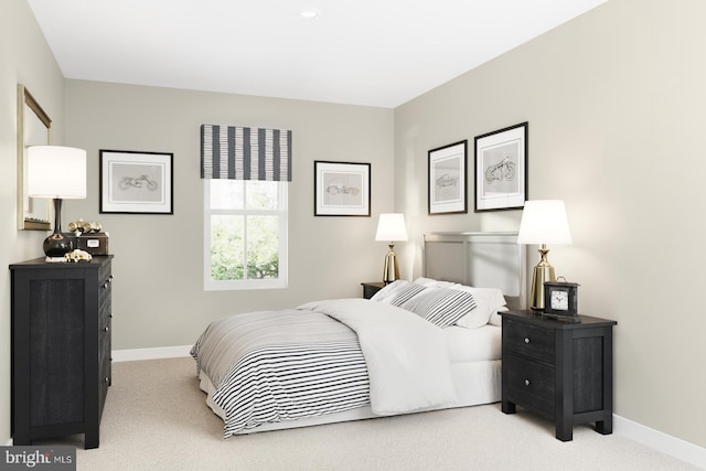 bedroom featuring carpet floors and baseboards