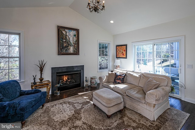 15 Milford Pl, Skillman, NJ 08558 - living room featuring a chandelier, recessed lighting, a fireplace with flush hearth, vaulted ceiling, and dark wood finished floors