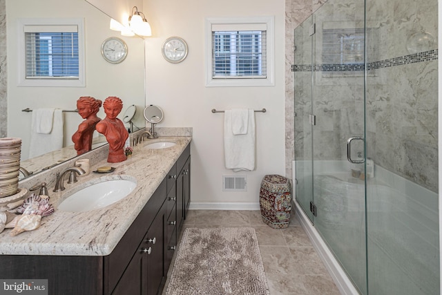 15 Milford Pl, Skillman, NJ 08558 - bathroom featuring a stall shower, visible vents, a sink, and double vanity