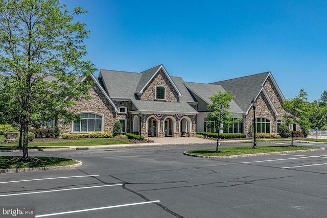 15 Milford Pl, Skillman, NJ 08558 - view of front facade with stone siding and uncovered parking