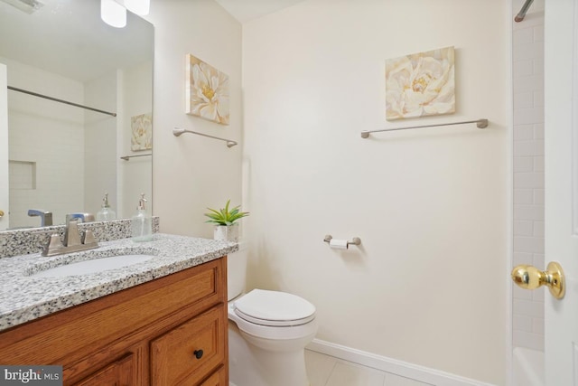 bathroom featuring visible vents, toilet, vanity, tile patterned flooring, and baseboards