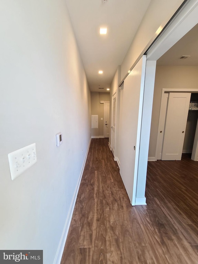 989 S Buchanan St Unit 320, Arlington, VA 22204 - hall with dark wood-style floors, visible vents, and baseboards