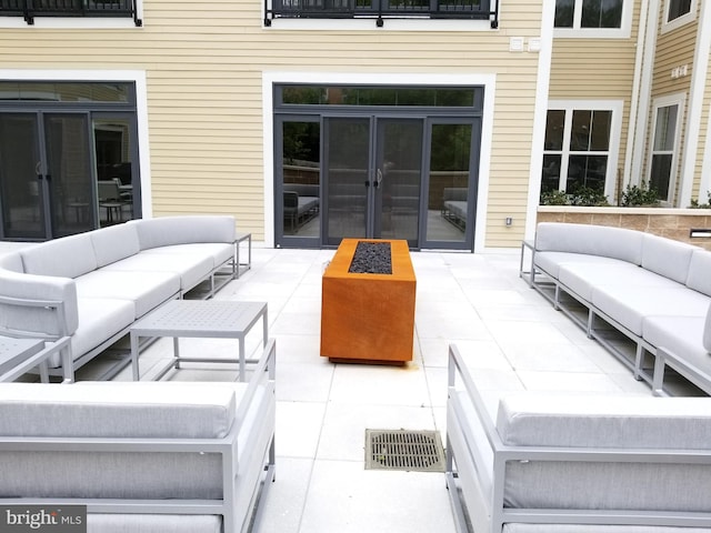 989 S Buchanan St Unit 320, Arlington, VA 22204 - view of patio with an outdoor hangout area