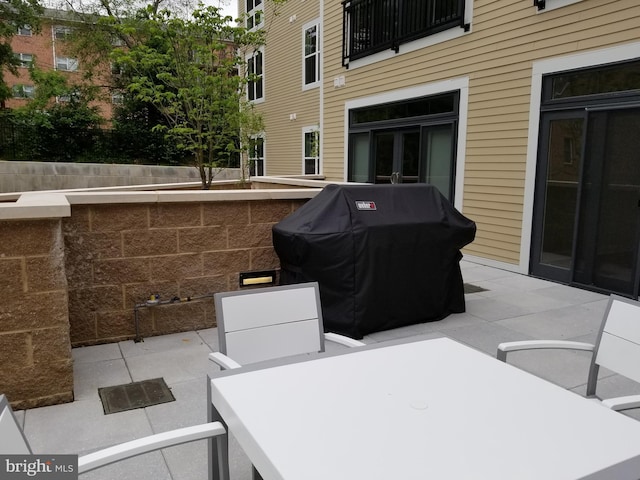989 S Buchanan St Unit 320, Arlington, VA 22204 - view of patio featuring a grill