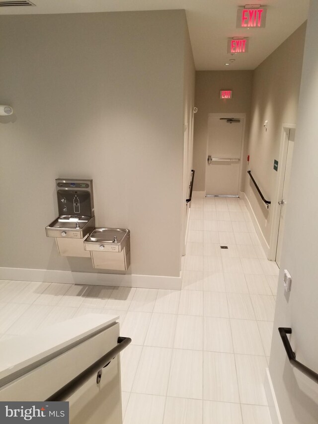 989 S Buchanan St Unit 320, Arlington, VA 22204 - corridor with baseboards