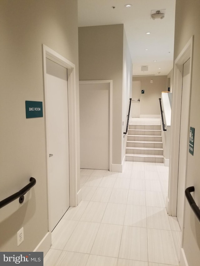 989 S Buchanan St Unit 320, Arlington, VA 22204 - hallway featuring stairway and recessed lighting