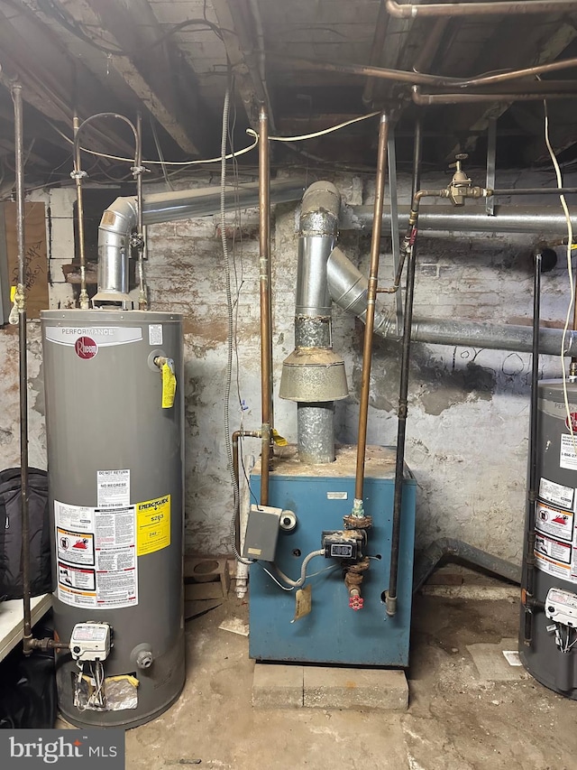 utility room with gas water heater