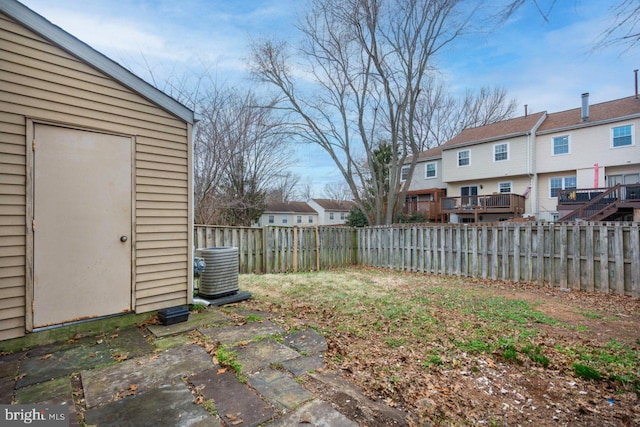 view of yard featuring a fenced backyard and a residential view