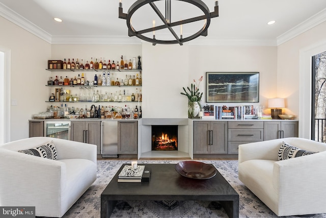 bar with wine cooler, a dry bar, crown molding, and wood finished floors