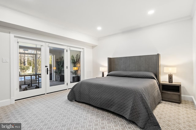 bedroom featuring access to outside, french doors, baseboards, and ornamental molding