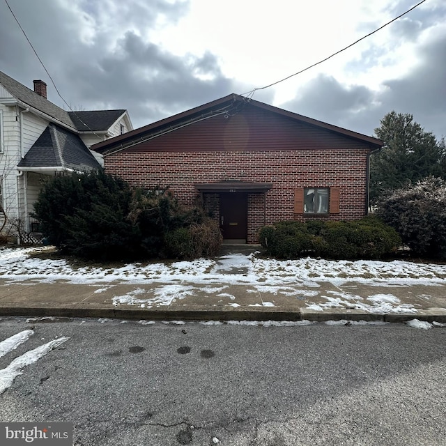 view of front of property with brick siding