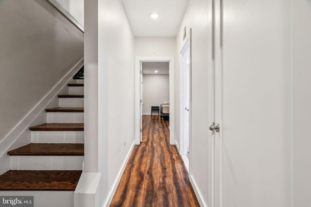 interior space with recessed lighting, stairway, baseboards, and wood finished floors