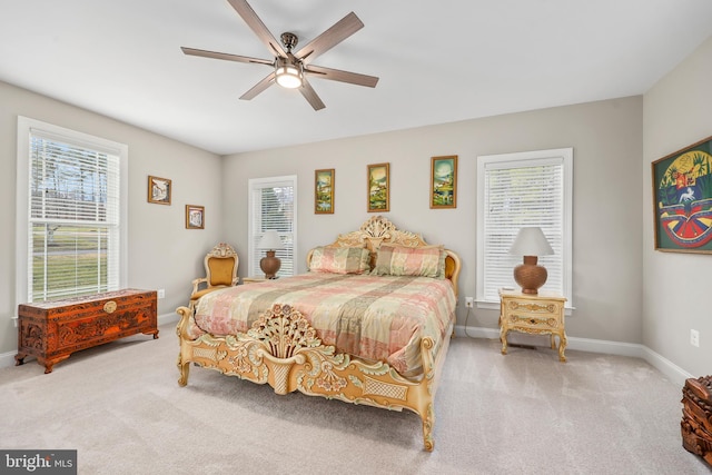 bedroom featuring baseboards, carpet, and a ceiling fan