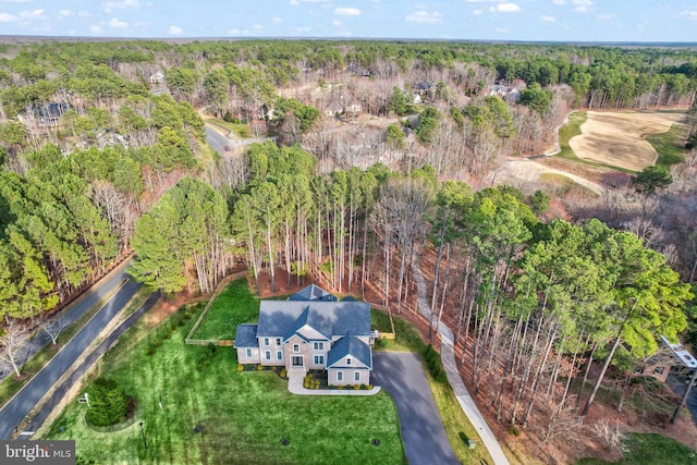 bird's eye view featuring a view of trees