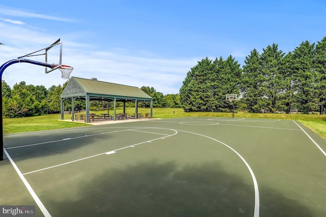 view of sport court featuring a gazebo, a lawn, and community basketball court