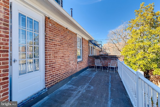 exterior space featuring a balcony