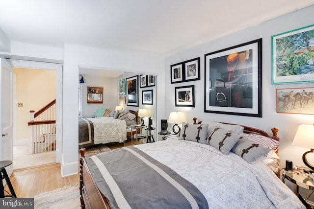 bedroom featuring light wood-style flooring