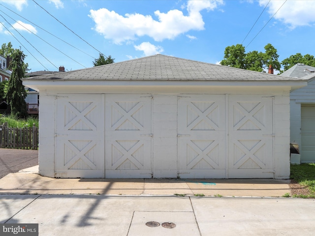 garage featuring fence