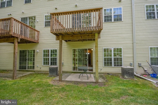 back of house with a patio area, central AC unit, and a deck