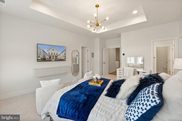 bedroom featuring light carpet, baseboards, a raised ceiling, and a chandelier