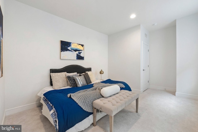 bedroom featuring recessed lighting, baseboards, and light colored carpet