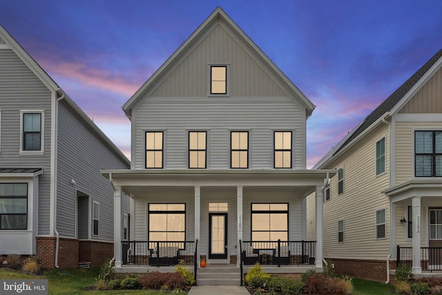 view of front of property with a porch and board and batten siding