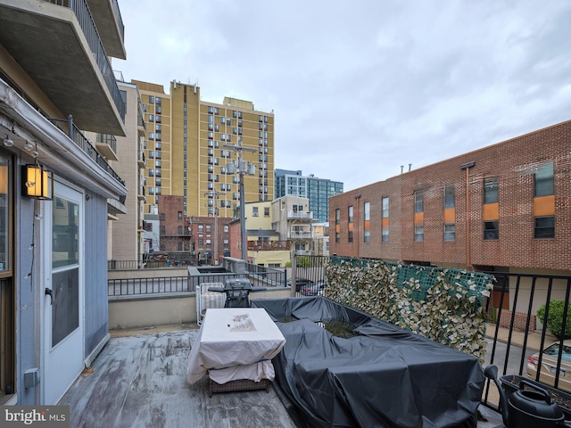 view of patio / terrace featuring a city view